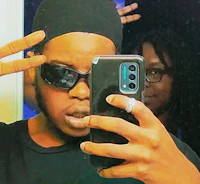 a man is taking a selfie with his phone